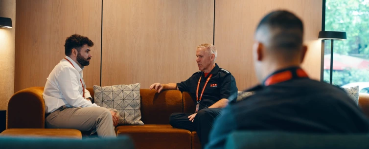 LFB Team discussing in office